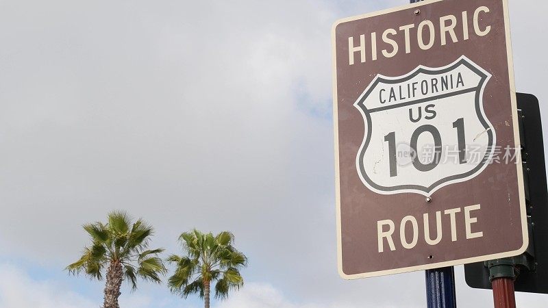 Pacific Coast Highway, historic route 101 road sign, tourist destination in California USA. Lettering on intersection signpost. Symbol of summertime travel along the ocean. All-American scenic hwy